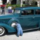 Image for article titled Why do car collectors put creepy dolls on their bumpers?